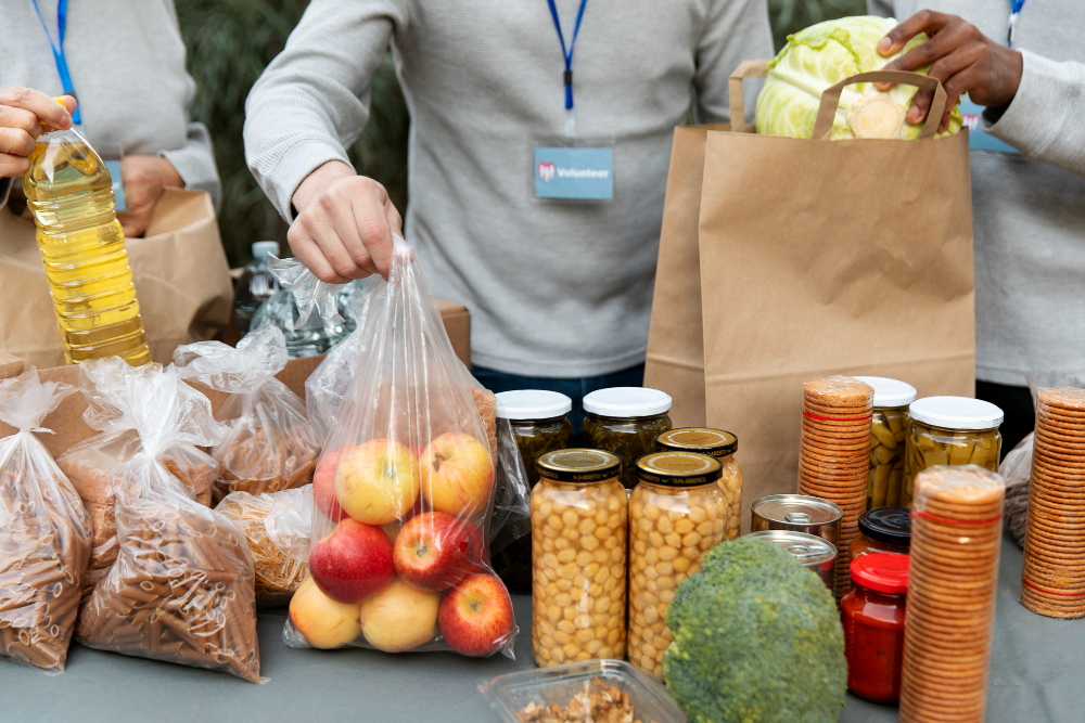 close-up-volunteers-collecting-food